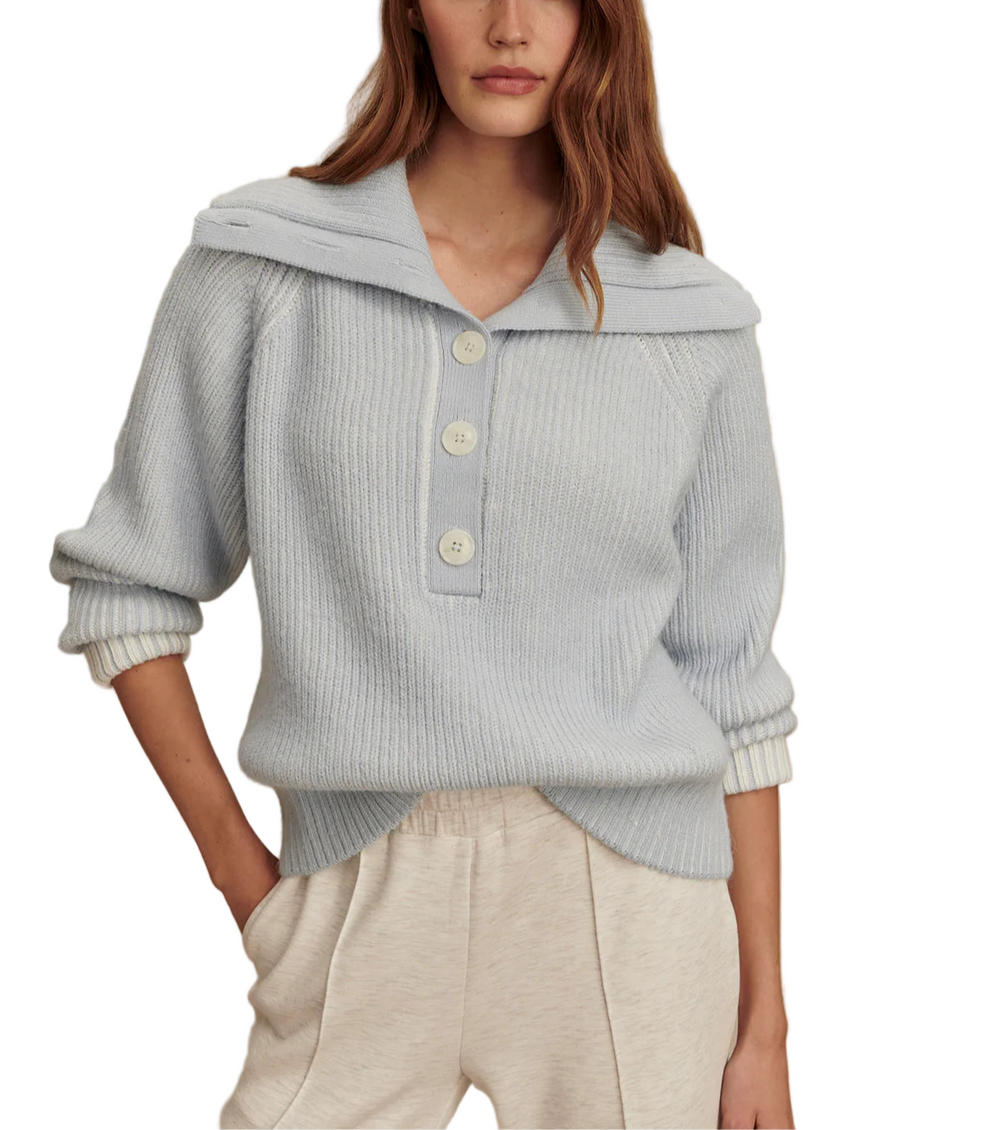 Minimalist design with thoughtful detailing - the Filey is made to elevate your everyday looks. Crafted from an Alpaca blend yarn, it features an elegant texture and tonal plating. Complete with raglan sleeves, a half-button placket, and a turn-back collar, the Filey offers relaxed comfort in a chic silhouette. Style with the matching Dionne beanie and Deville scarf for a coordinated look.