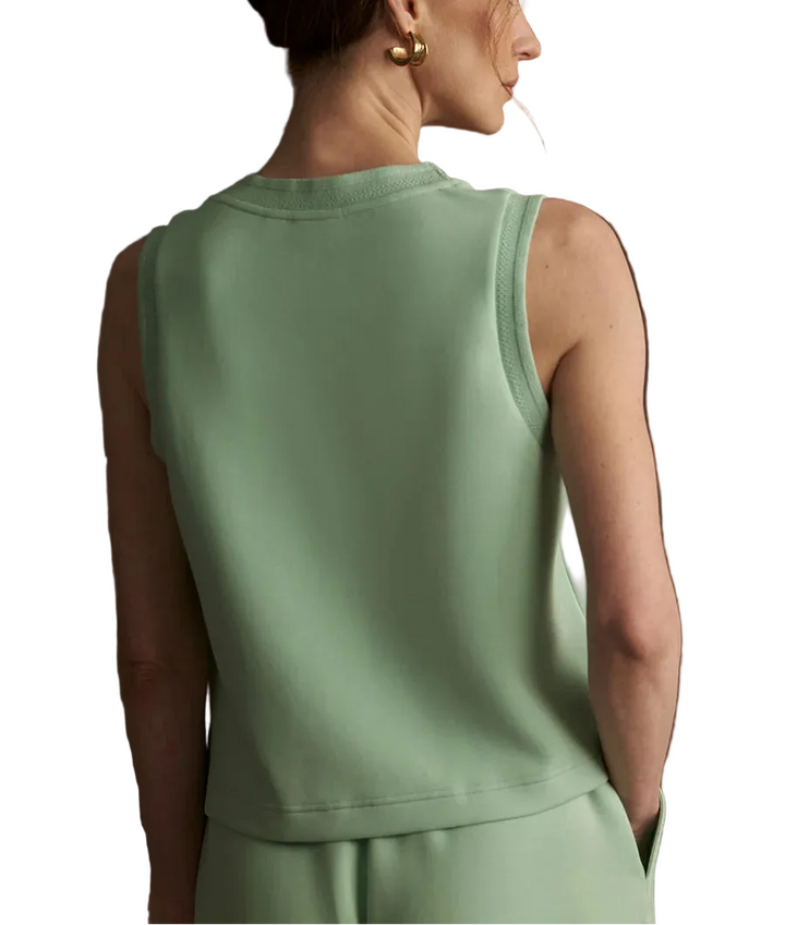 Made from DoubleSoft®, this scoop-neck tank features decorative trim and side splits for comfort and ease. Its slightly cropped silhouette makes it a versatile piece for effortless styling.
