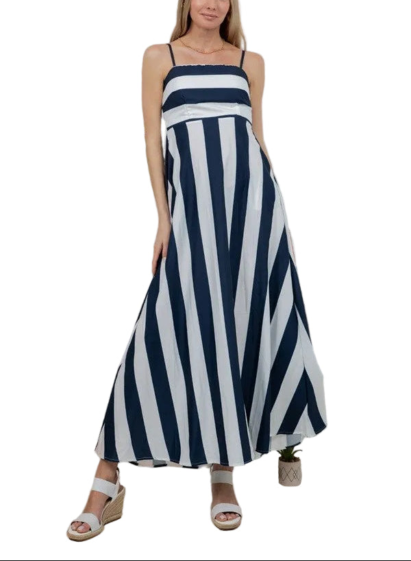 The Beth Striped Midi Dress combines timeless style with modern versatility. Classic navy and white stripes create a flattering, slimming effect that works for any season. The sleeveless design offers breathable comfort for warm weather, while the midi length provides elegant coverage suitable for casual outings, weekend brunches, or dressed-up occasions. The contrast striping adds visual interest without overwhelming, making it easy to pair with your favorite accessories and layers. 