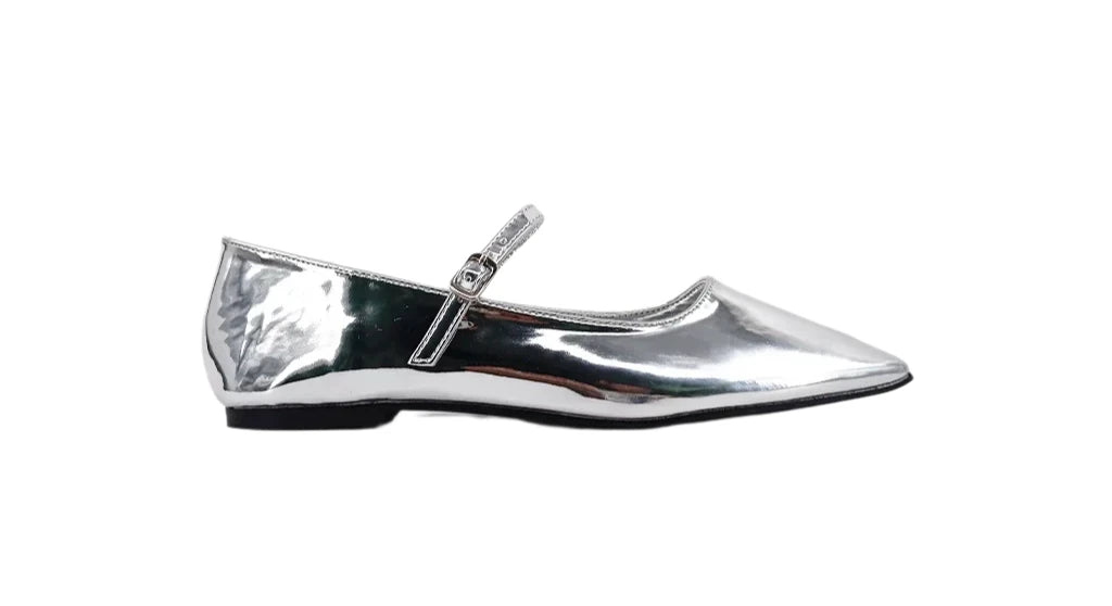 Elevate any outfit with the ADDISON ballet flats. These shoes revive a beloved trend with a touch of elegance. They are made from luxurious faux laminated silver leather, featuring a delightful Mary Jane shape, pointed toes, and a dainty buckle-fastening strap. Their timeless design effortlessly elevates various ensembles, adding a sophisticated charm to every look.
