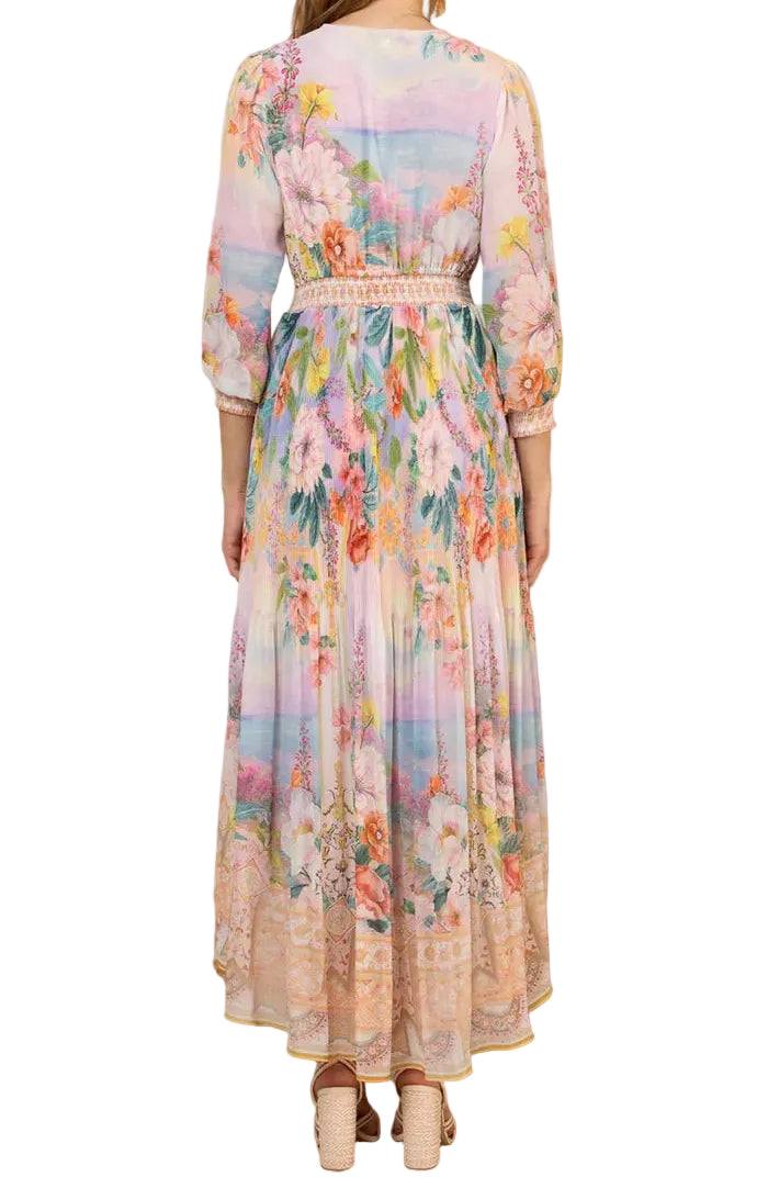 Woman wearing a floral dress with a wooden wall background
