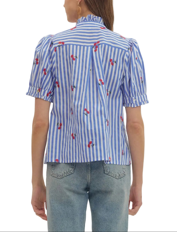 Striped embroidered cherry puff short sleeve top featuring ruffle bib front detail. Button closure at front. Ruffle trim at stand collar and sleeve cuff. Unlined. Woven. Non-sheer. Lightweight.
