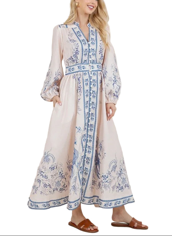 Effortless elegance meets everyday comfort in this printed long sleeve v-neck maxi dress. The flowing silhouette skims the body gracefully, while the classic v-neckline adds a touch of sophistication. Long sleeves provide coverage and versatility for any season, making it perfect for layering or wearing solo. The vibrant apricot print brings warmth and personality to your wardrobe. Ideal for casual outings, weekend brunches, or relaxed evenings out.