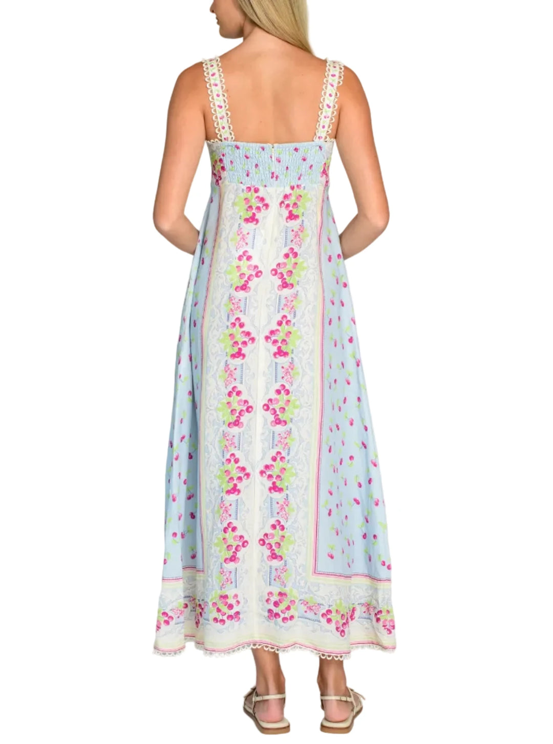 With her fitted empire bodice and flattering paneled skirt, Annalisa is a favorite silhouette all year long. She looks especially chic in this stunning Cherries print, elevated with a decorative border and picot trim. Adjustable straps and a smocked back offer a comfortable fit for the perfect midi dress.

Product Details

Viscose linen
Button adjustable straps
Fitted front bodice
Back smocking and zipper
Side seam pockets
Fully lined
Decorative &amp;amp; picot trim accents