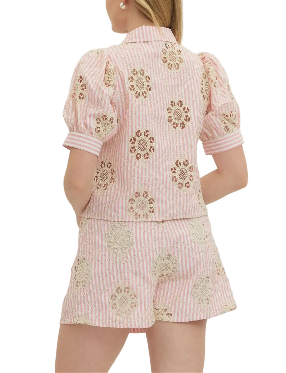 Elevate your wardrobe with the Annalise Shirt and Skirt Set, where romantic details meet everyday charm. The puff sleeve top features an enchanting floral lace overlay panel that adds a touch of whimsy and sophistication. Perfect for brunch dates, garden parties, or whenever you want to feel effortlessly put-together. This coordinated set takes the guesswork out of styling, letting you step out with confidence and flair.