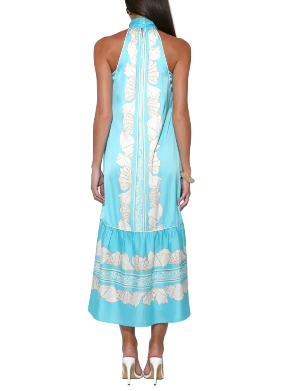 Drenched in a tranquil Seafoam and Ivory palette, this sweeping maxi dress features a whimsical all-over seashell print that feels both sophisticated and playful. The silhouette is defined by a chic halter neckline that elegantly frames the shoulders, leading into a fluid, floor-grazing skirt. Designed to capture the light and the breeze, the Ariella offers a relaxed yet refined fit that transitions seamlessly from day to evening.