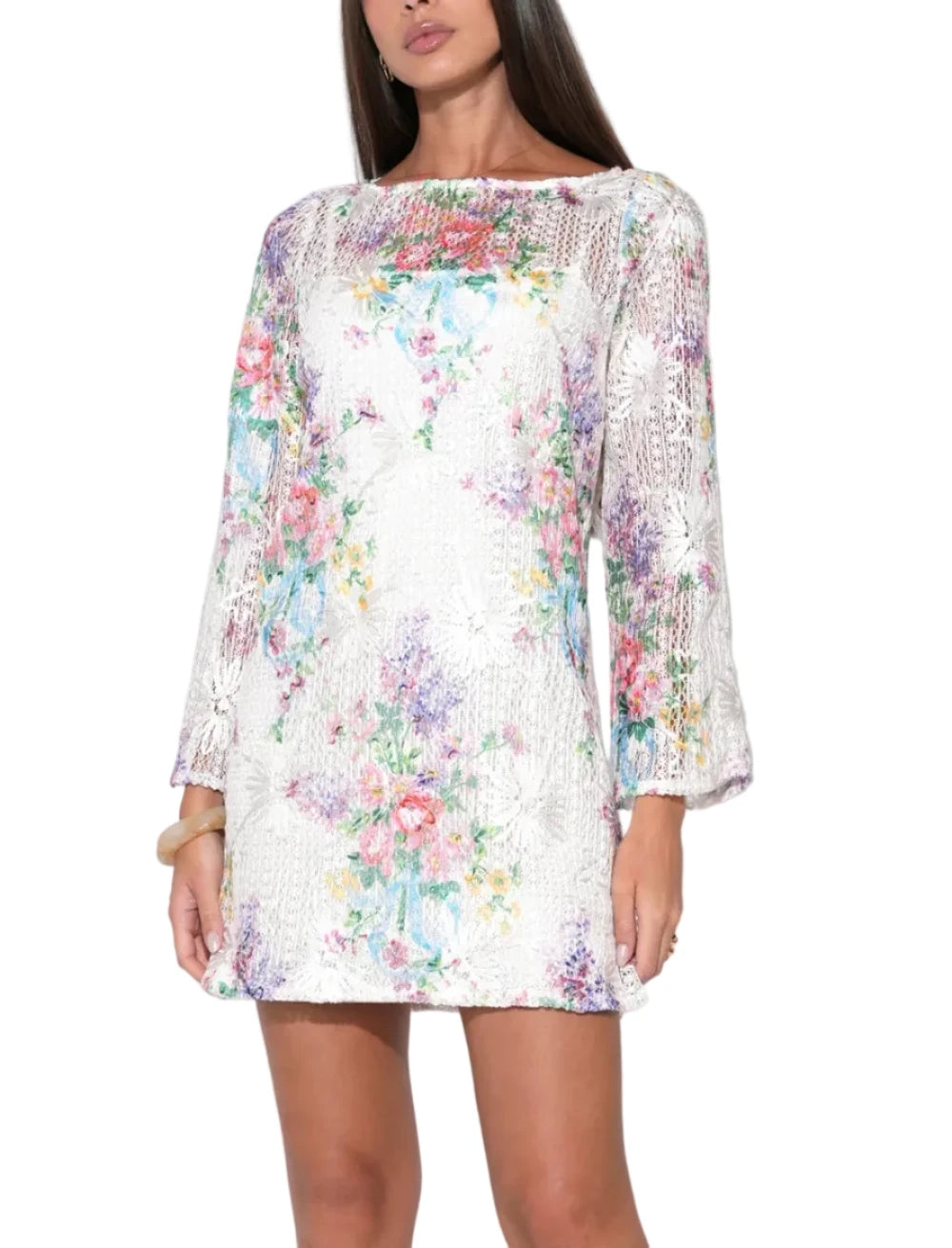 Rendered in a stunning Ivory Floral, this dress is a tactile masterpiece, featuring intricate crochet work that forms a delicate floral tapestry. The Bella is designed with long, slightly sheer sleeves that offer a romantic contrast to the structured, opaque bodice. Its mini-length silhouette provides a youthful energy, while the high-quality crochet texture adds a vintage, artisanal feel.