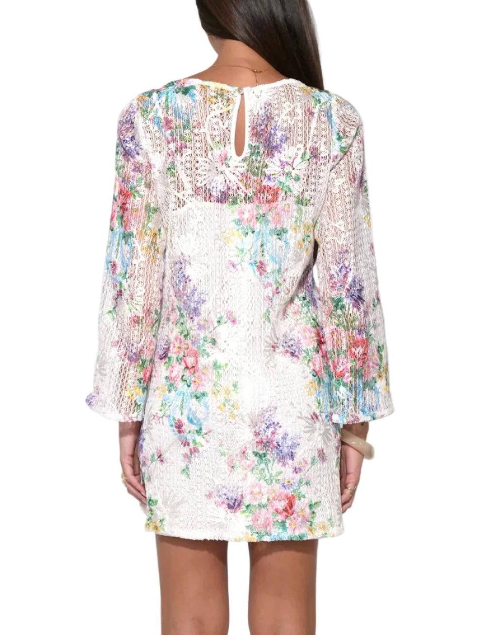 Rendered in a stunning Ivory Floral, this dress is a tactile masterpiece, featuring intricate crochet work that forms a delicate floral tapestry. The Bella is designed with long, slightly sheer sleeves that offer a romantic contrast to the structured, opaque bodice. Its mini-length silhouette provides a youthful energy, while the high-quality crochet texture adds a vintage, artisanal feel.