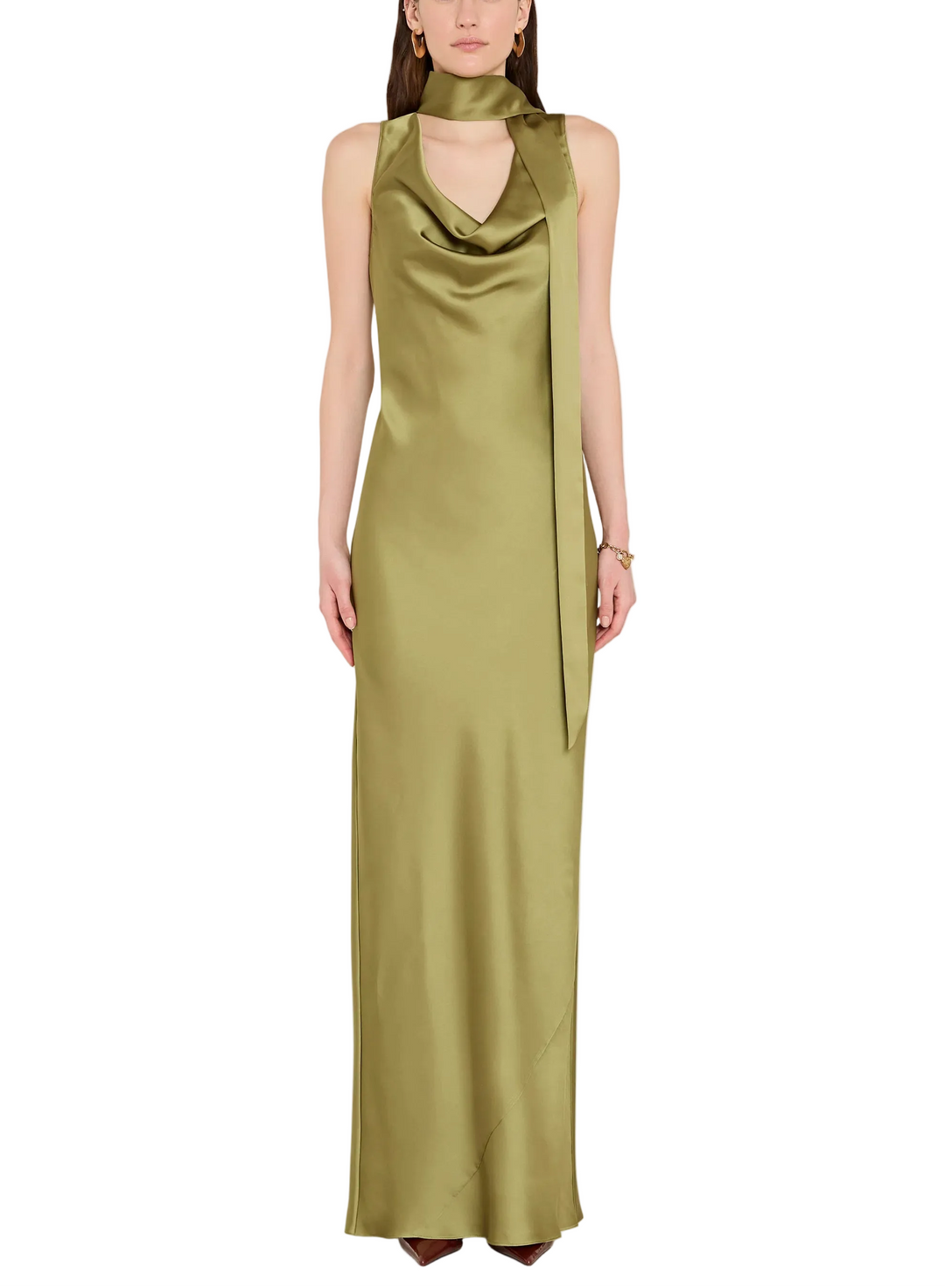 
The Paula Maxi in vert, an elegant olive green. This floor-length gown is cut on the bias from luxurious charmeuse for an easy comfortable fit for all shapes. The cowl neck features an attched scarf detail that can be styled in various ways.