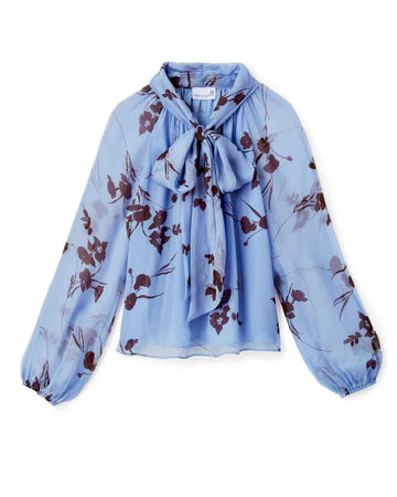 Light as a whisper and touched with painterly charm, the Alma Blouse in Blue Mist floats between seasons—its sheer floral print bringing an air of romance to any day.

Ethereal Fabric: Sheer chiffon with a lined bodice for wearable ease
Soft Detail: Functional neck tie and elasticated cuffs
Feminine Silhouette: Long raglan sleeves and fluid drape