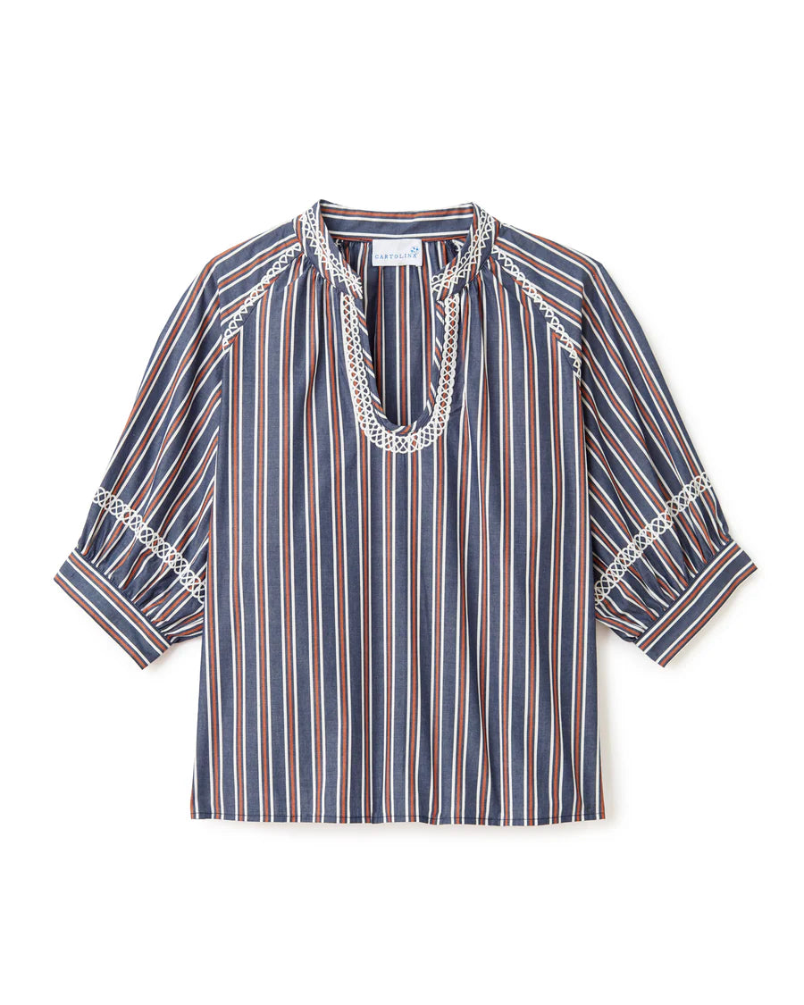 The Eleanor Top in Navy Stripe feels both polished and playful—defined by crisp stripes, delicate embroidery, and a breezy silhouette made for warm days that blur into night.

 • Signature Detailing: White embroidery at neckline, shoulders, and sleeve cuffs
 • Easy Shape: U-shaped neckline and raglan short sleeves
 • Thoughtful Finish: Functional button at sleeve cuff; unlined for airy comfort