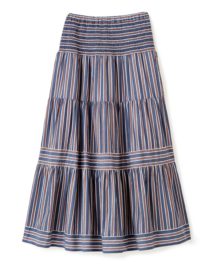 With its sweeping tiers and crisp navy stripe, the Kylie Midi Skirt feels made for slow mornings and long city afternoons. It blends softness and structure in a silhouette that moves with quiet confidence.

Soft Structure: Dropped yoke and tiered design create natural flow
Effortless Fit: Pull-on smocked waistband offers comfort with shape
Functional Detail: Discreet side pockets for everyday ease