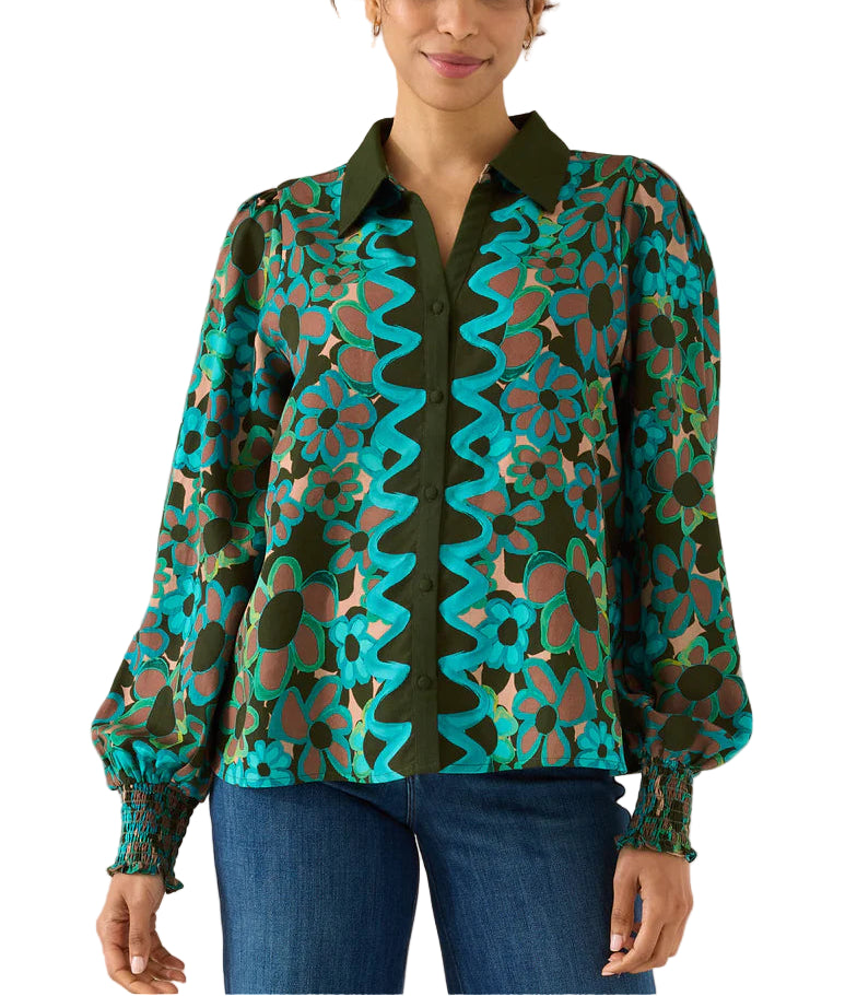 Timeless and sophisticated, our Dana Top features a classic collar, slightly blouson sleeves, and smocked wrist detail with an added ruffle edge. A bold floral print is accented with a whimsical border along the front placket.