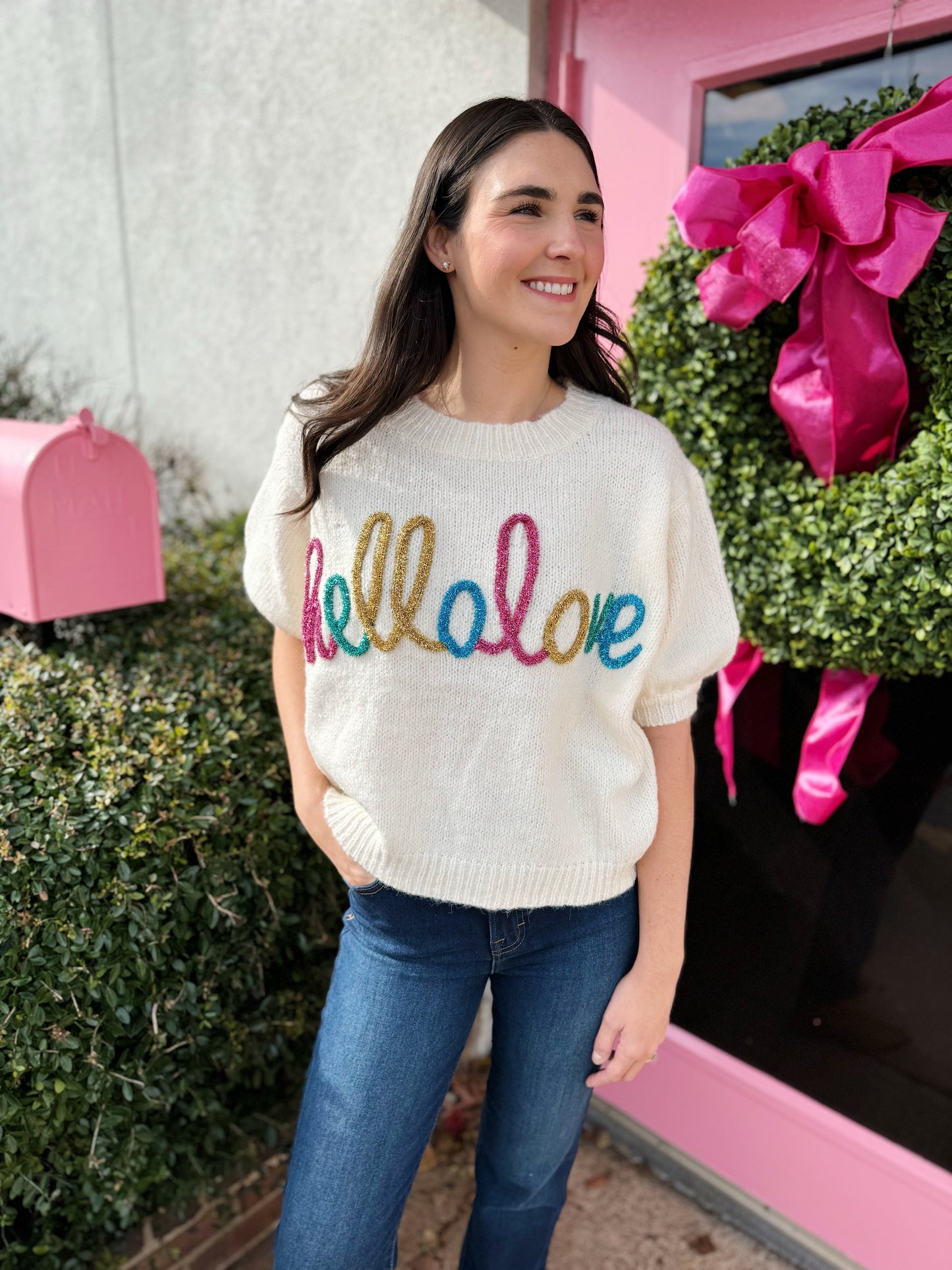 Hello Love Tinsel Sweater, short sleeve sweater with different colored tinsel that says “hello love” 