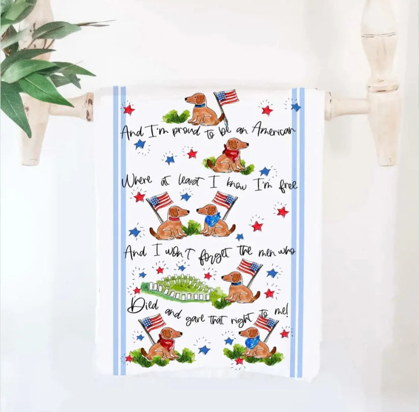 Tea towel with patriotic design featuring dogs and text on a white background