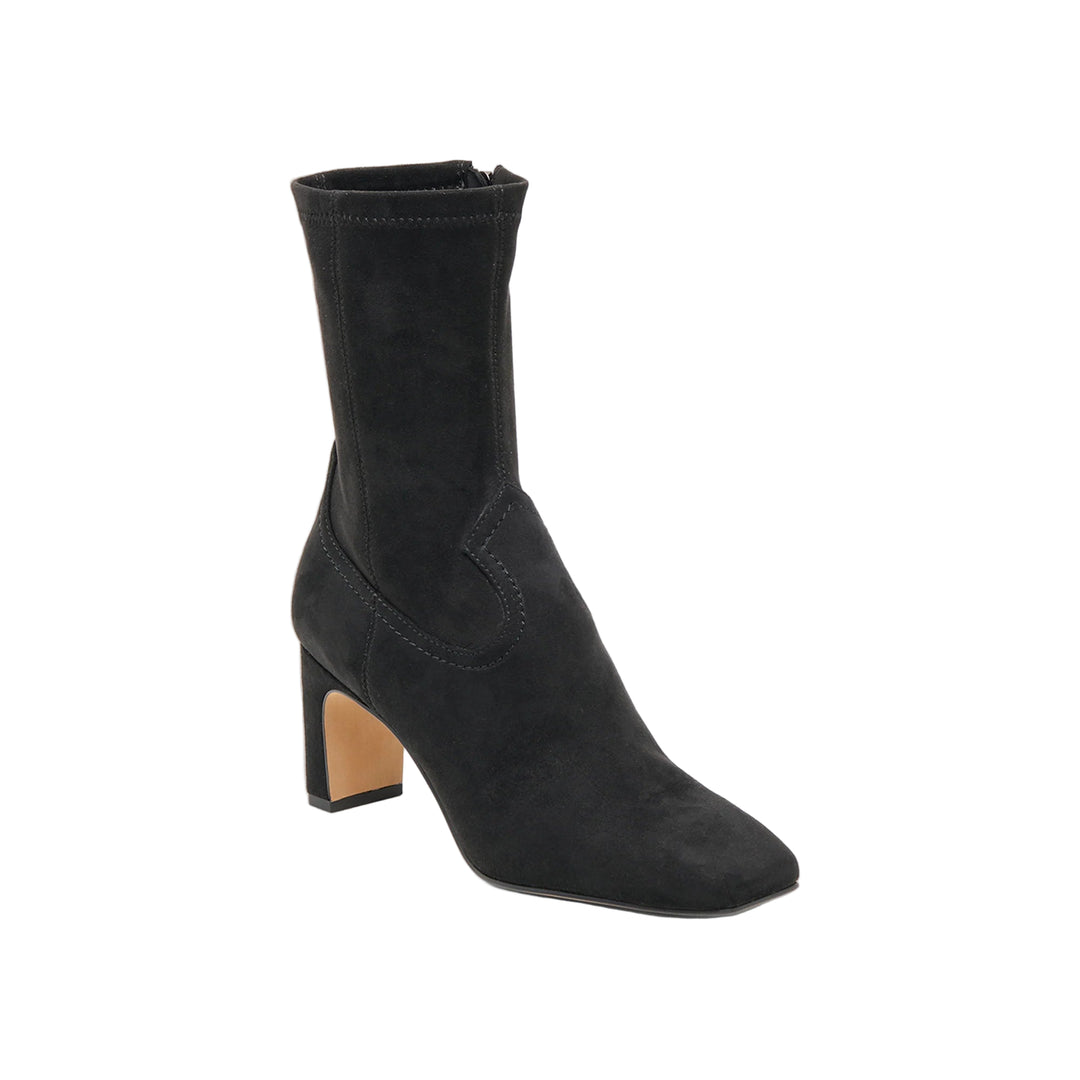Transition from day to night in ROAN. This mid-calf bootie’s sleek silhouette meets under-the-radar western stitching details and a modern squared toe. Her four versatile colorways will fit any outfit and any mood.

Textile Upper
Recycled Synthetic Outsole
Textile, Leather + Water-based Leather Alternative Lining
Water-based Leather Alternative Sock
7.9" Shaft Height
10.2" Leg Circumference
2.8" Heel Height
Imported