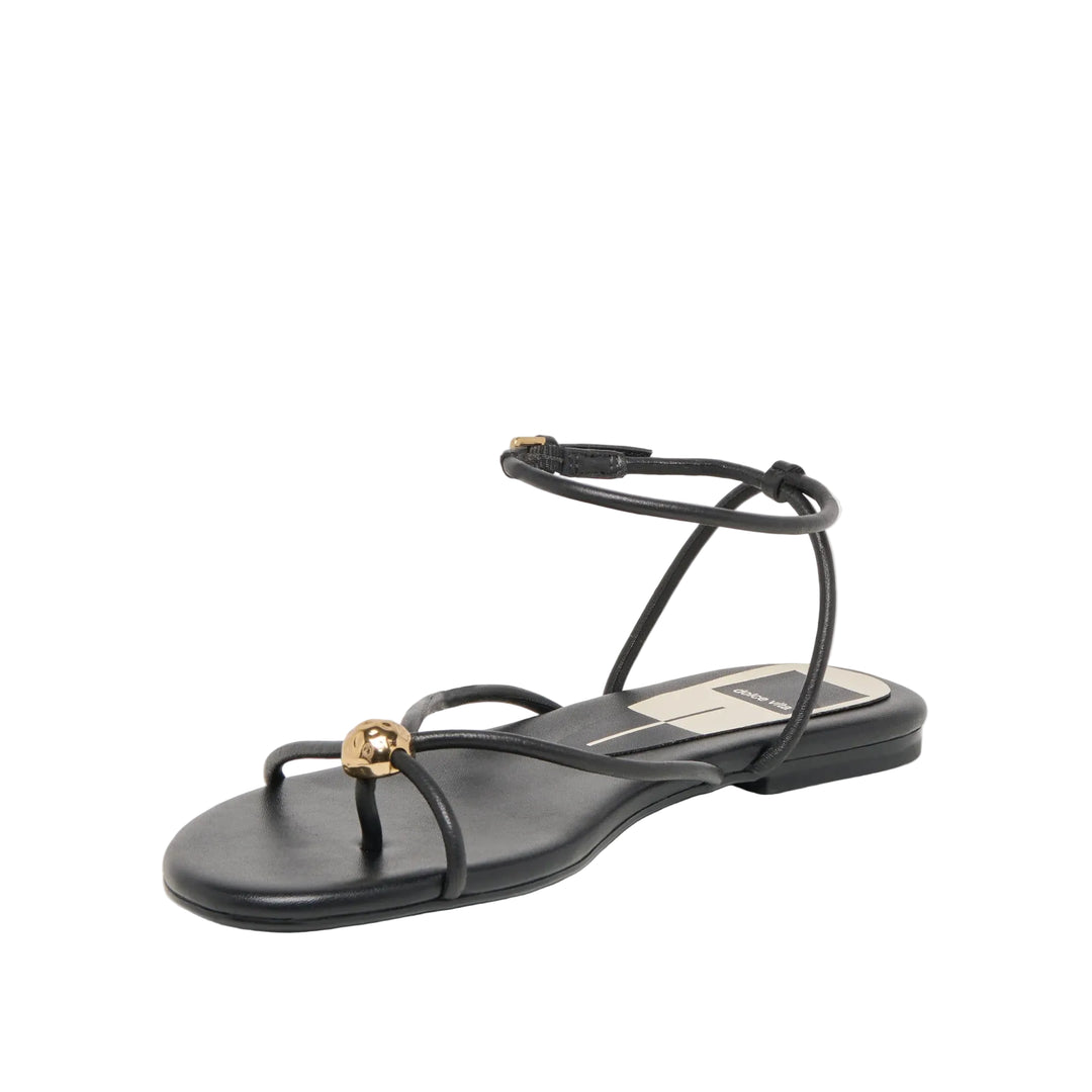 
KENLEY blends casual, comfort, and sophistication. Her intersecting straps climb just above the ankle, with a buckle to keep you secure while you walk. Top it all off with glimmering metal bead at the toe, this is a sandal that attracts effortless attention.