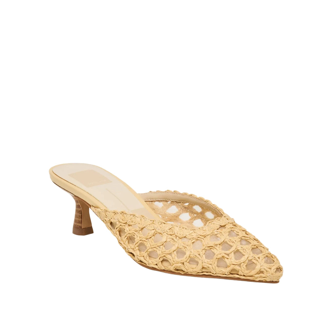 Meet CLEO LOOP, your new effortlessly polished warm‑weather mule. This sleek silhouette features a chic pointed toe, a comfy low architectural heel, and an airy natural raffia design that feels both modern and timeless. Crafted in a versatile hue with a wood‑stacked heel for an earthy, refined finish, she’s a warm‑weather-ready addition to dressy trousers, day-to-night looks, or vacation-ready dresses. Feel good stepping out in this easy-to-wear silhouette crafted with mindful, responsibly sourced materials