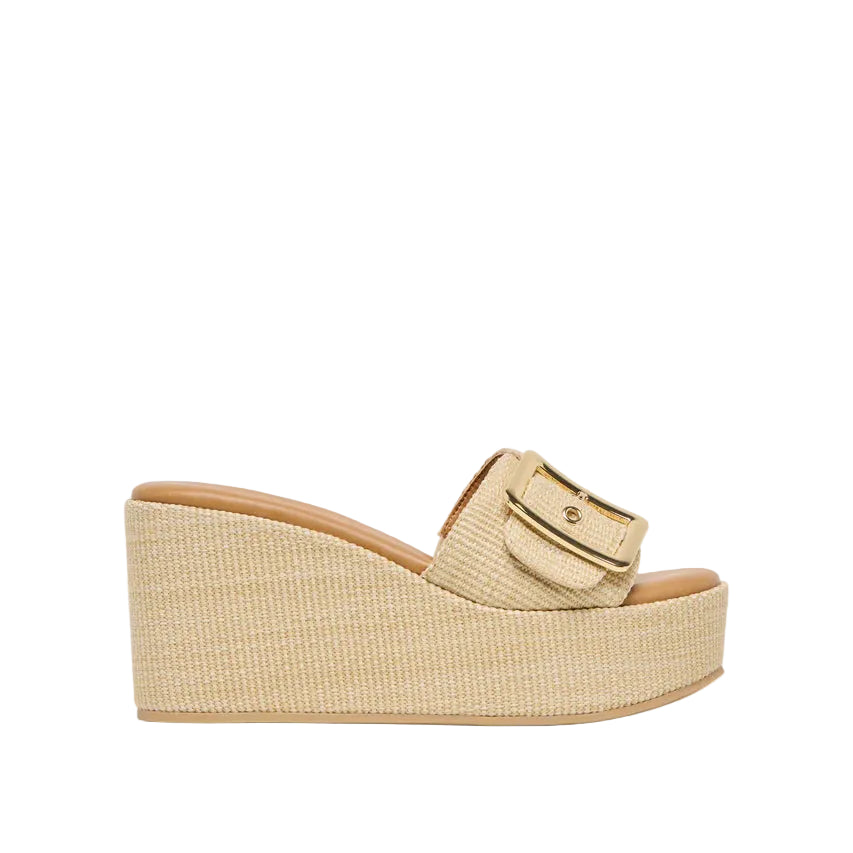 Step out in JILIAN’s head-turning details this season. This platform wedge features a slide-on silhouette with a belt-like strap and oversized maximalist metal buckle. Available in light natural or warm mocha raffia, her all-over raffia texture is a classic and versatile upgrade to any warm weather wardrobe. Her supportive wedge sole is comfortable for all-day wear while her elevated details dress up almost any outfit. 