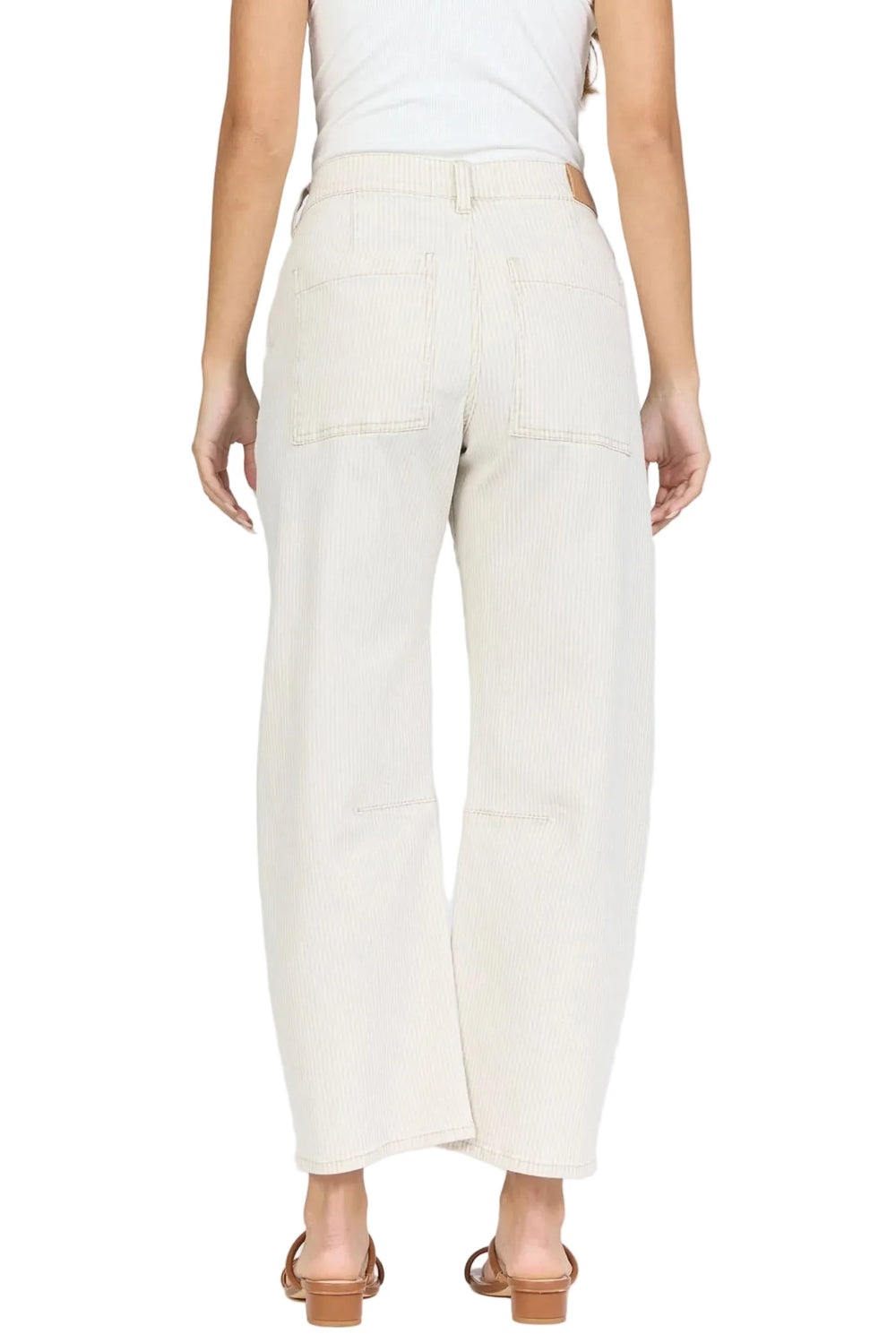 Introducing high rise cropped barrel leg jeans in sand stripe, a perfect synthesis of style and comfort.

Designed with a clean hem and crafted from stretch color denim, these jeans offer a modern twist on the classic silhouette.

The high rise fit ensures a flattering shape, making them an ideal choice for those who love high waisted bikini styles.

These jeans are perfect for any laid-back day or night out, combining quality with utility, and are a versatile staple for every wardrobe.

MATERIALS & CARE
Ma