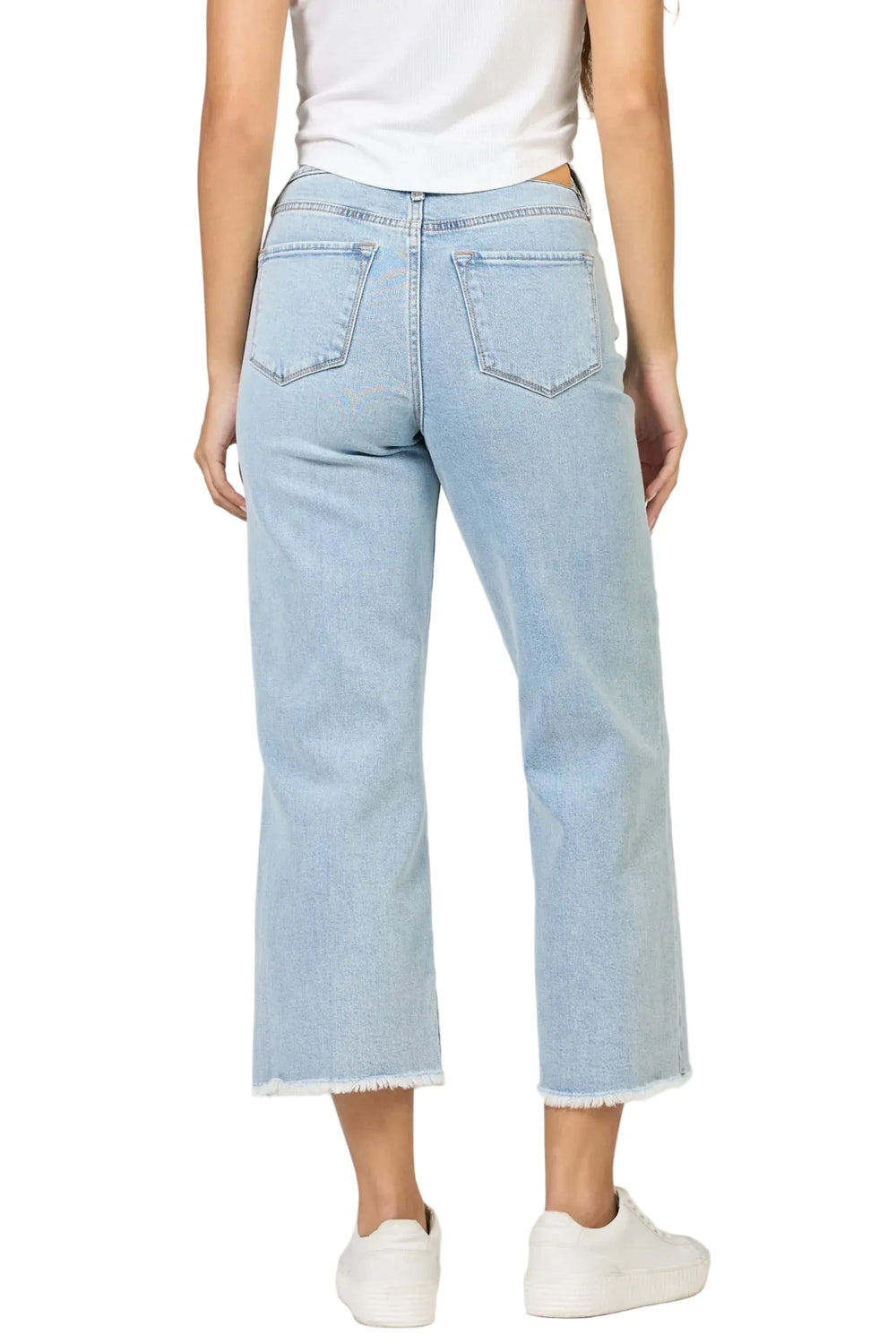 High rise raw hem straight leg cropped jeans in a light wash denim offer the perfect blend of style and comfort.

Designed with a flattering high rise, these jeans feature a raw hem and a straight leg cut, making them both trendy and versatile for any wardrobe.

The cropped length adds a touch of modern flair, making them an excellent choice for showcasing your favorite footwear.

Whether you're pairing them with a casual top or dressing them up, these jeans are a go-to staple for any lifestyle.
