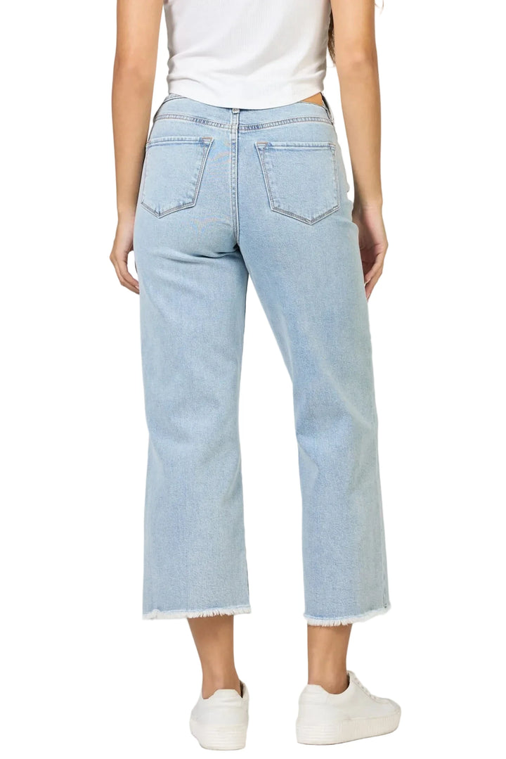 High rise raw hem straight leg cropped jeans in a light wash denim offer the perfect blend of style and comfort.

Designed with a flattering high rise, these jeans feature a raw hem and a straight leg cut, making them both trendy and versatile for any wardrobe.

The cropped length adds a touch of modern flair, making them an excellent choice for showcasing your favorite footwear.

Whether you&