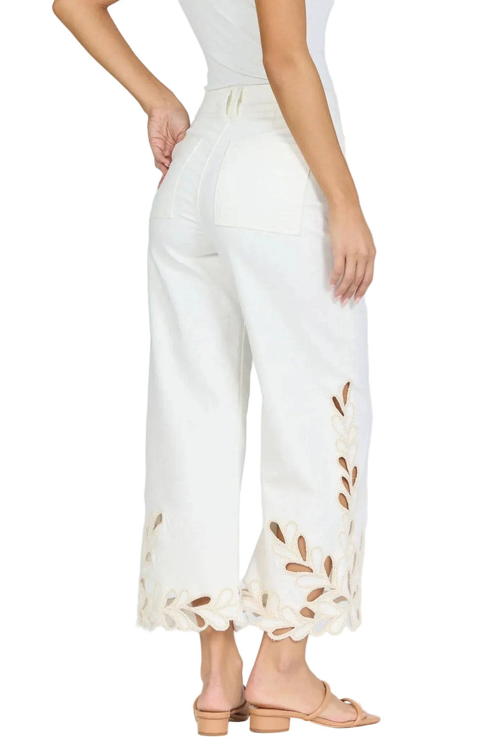 Embrace a chic and stylish look with these high rise wide leg cropped jeans, featuring an intricate scalloped hem and detailed embroidery.

Perfectly designed for versatility and comfort, the jeans are made from stretch denim in a classic white color, providing the ideal balance of utility and fashion for any lifestyle.

Elevate your wardrobe with this go-to piece that pairs effortlessly with your closet staples.

Whether you're seeking the elegance of a high waisted bikini fit or the appeal of bell bottom 