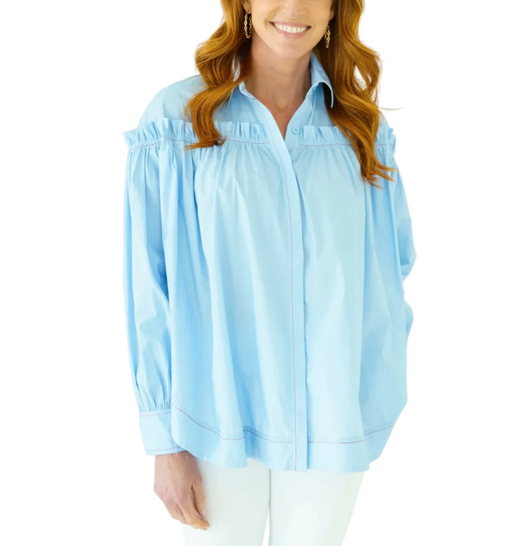Everyone loves the Miriam Top — a relaxed, flowy swing style designed for an effortless oversized look. Made to lay loose and easy, this lightweight cotton poplin piece delivers comfort without sacrificing style. The playful color stitching detail adds just the right pop, giving this everyday favorite a fun and elevated finish.

Easy, breezy, and designed to move with you, the Miriam Top is the perfect throw-on-and-go style you’ll reach for again and again.

Size 1 fits 0-4
Size 2 fits 6-12