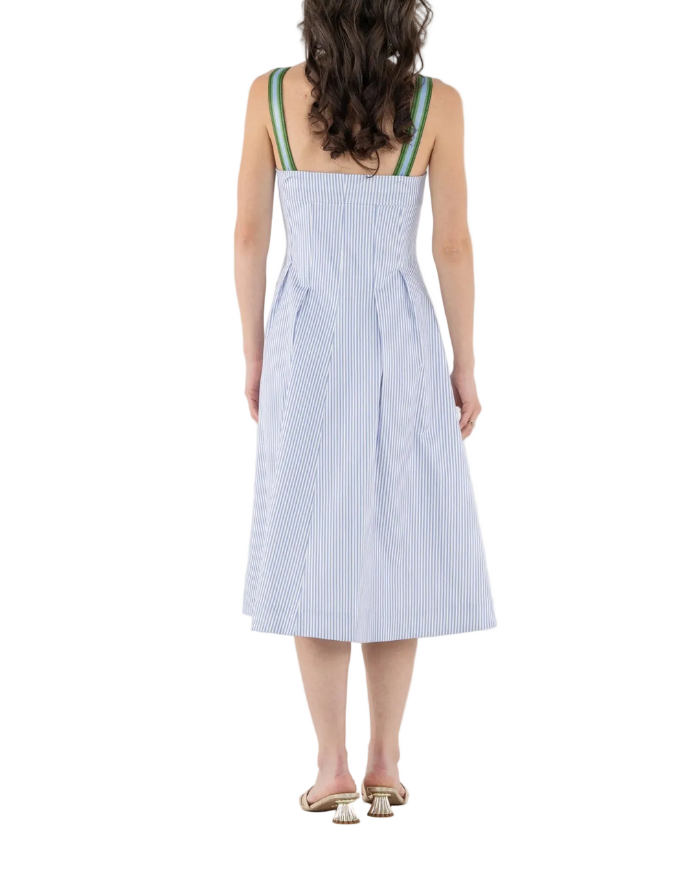 The Constance Midi in Grapemist Stripe offers a soft, feminine take on everyday dressing. Designed with an empire silhouette, this style is fitted through the bodice and flows into a flattering midi-length skirt. Adjustable straps and covered buttons along the front add thoughtful detail, while a side zip keeps the finish clean. Polished and easy to wear, it is ideal for spring gatherings, date nights, and moments that call for a graceful touch.