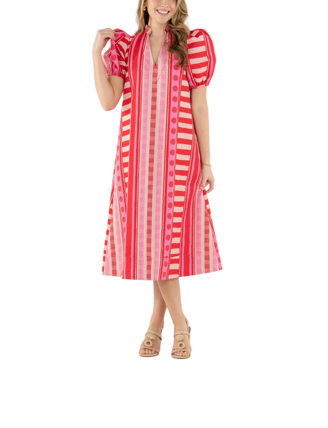 The Hampton Dress in Peach Jubilee is a playful yet polished statement with a distinctly feminine spirit. Designed with an easy, relaxed shape, this style features a mandarin-style collar, puff sleeves, and an asymmetrical layout that creates visual interest and movement. Peach Jubilee showcases a vibrant mix of patterns, rendered in a luxe jacquard that offers soft structure and a subtle glow. Lighthearted and confident, this dress strikes the perfect balance between flirty charm and elevated design.