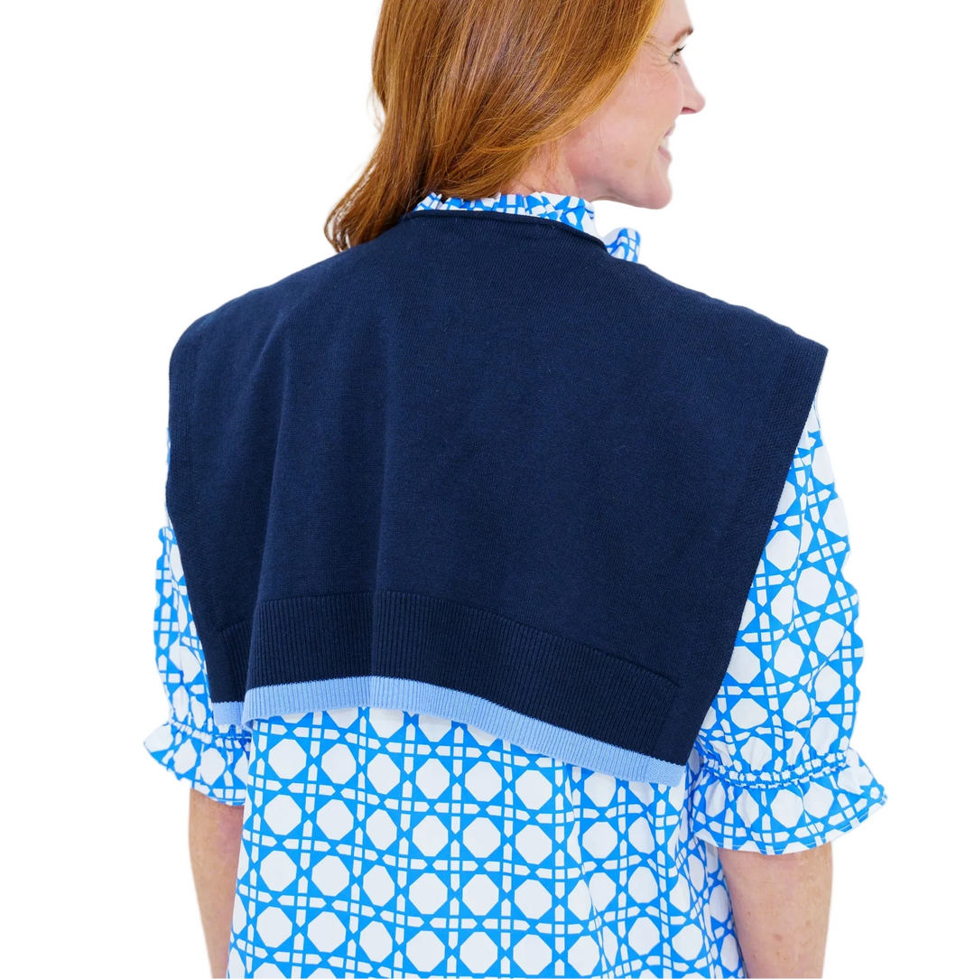 Caryn Cardi
Caryn loves a sweater tied over her shoulders, and the Caryn Cardi creates that same chic, layered look without the extra bulk. This lightweight faux cardigan adds a playful pop of color and texture to any outfit. Designed in a soft knit with contrasting color details, it is an effortless finishing touch for dresses, tops, and button-down shirts.