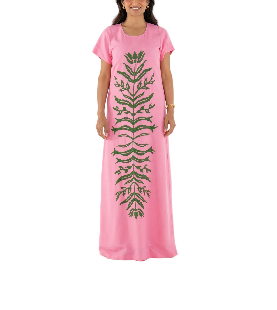 The Cornelia Dress in Rosé is a classic and foundational silhouette elevated through thoughtful craftsmanship. Designed with a round neckline, classic short sleeves, and a relaxed, flowing shape, it offers effortless polish. A green floral appliqué brings traditional Indian motifs to life, with each stitch adding subtle, artful texture. Romantic and refined, this piece feels both heirloom and modern—a true celebration of quiet detail and design.