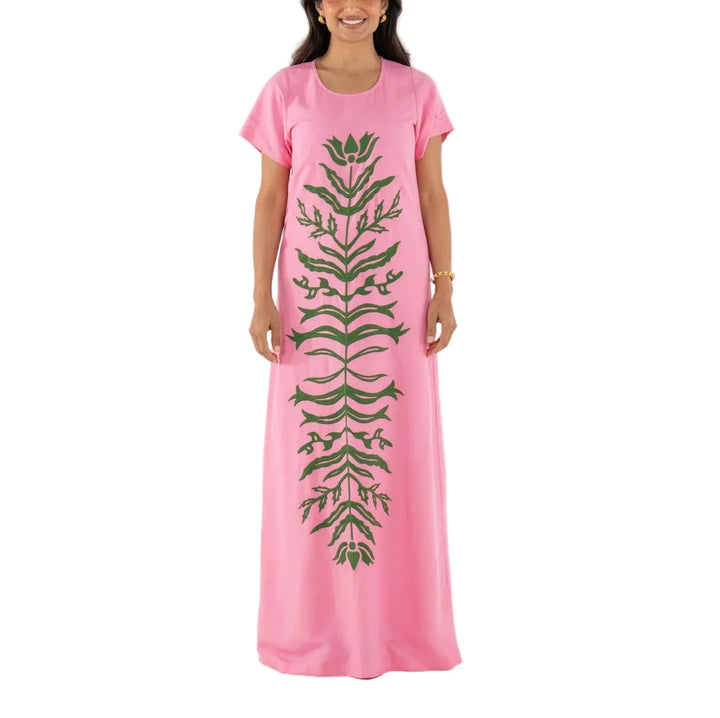 The Cornelia Dress in Rosé is a classic and foundational silhouette elevated through thoughtful craftsmanship. Designed with a round neckline, classic short sleeves, and a relaxed, flowing shape, it offers effortless polish. A green floral appliqué brings traditional Indian motifs to life, with each stitch adding subtle, artful texture. Romantic and refined, this piece feels both heirloom and modern—a true celebration of quiet detail and design.