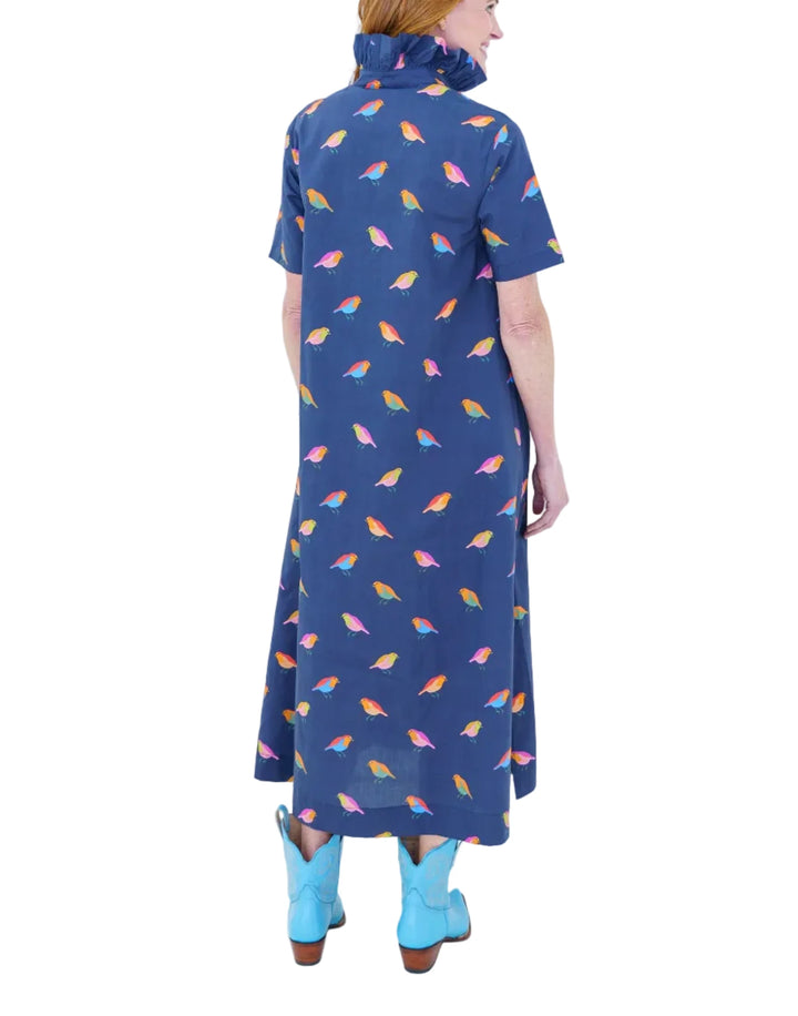 Our best-selling Georgia body is back in a whimsical bird print made for fall. Crafted from crisp cotton poplin, it features a flattering A-line silhouette, feminine ruffle neckline, and an easy short sleeve with comfortable coverage. Pops of color throughout the bird print add a playful touch, while side pockets make it effortlessly practical for everyday wear.

Fabric: 100% Cotton Poplin
Length: 50 inches
Fit: Relaxed A-line silhouette.