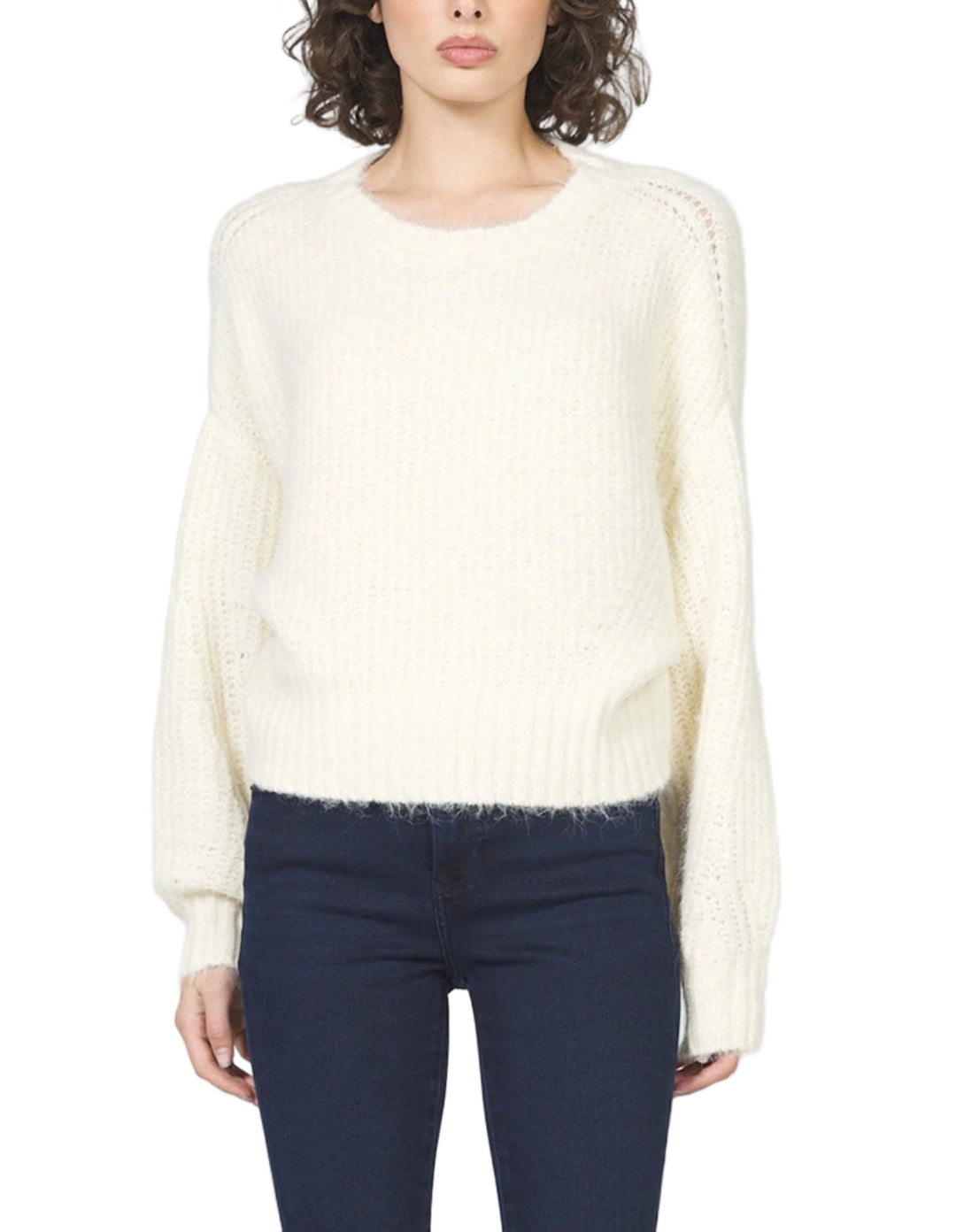 Indulge in cozy elegance with Mylan long sleeves sweater, crafted from brushed yarns for warmth and showcaseing a blend of textures for an elevated look.

This timeless crew neck piece in relaxed fit enhances your wardrobe with its soft feel and versatile style