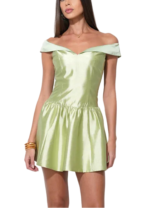 Featured in a bold Chartreuse color—a vivid, yellow-green shade—this dress is guaranteed to turn heads. Crafted from a luxurious satin fabric, the dress possesses a beautiful sheen and a fluid, party-ready drape.