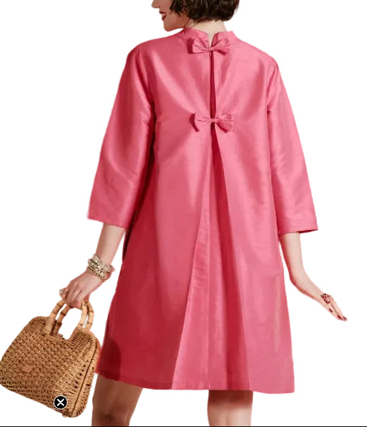Let us introduce you to the dashing Diplomat Mini. With its enduring allure of bows and pleats cascading down the silhouette, this mini dress will be a wardrobe hero for years to come. Its unabashedly feminine design will leave you resplendent in its style. Flirty mini dress with a sleek mock neckline for a polished look  