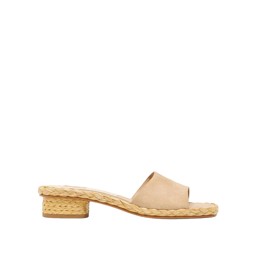 Your spring staple, perfected. DIXI pairs a sleek slide-on silhouette with a natural woven sole and slightly raised block heel for a casual yet chic look. You can’t go wrong with any of her essential warm weather shades—bone leather, platinum leather, camel suede, or brown suede. This easy breezy slip-on sandal is made for effortless styling with flowy cotton dresses, relaxed denim, or trending capris. Sustainably-crafted and made for all-day wear, this go-to works for any part of your week.


