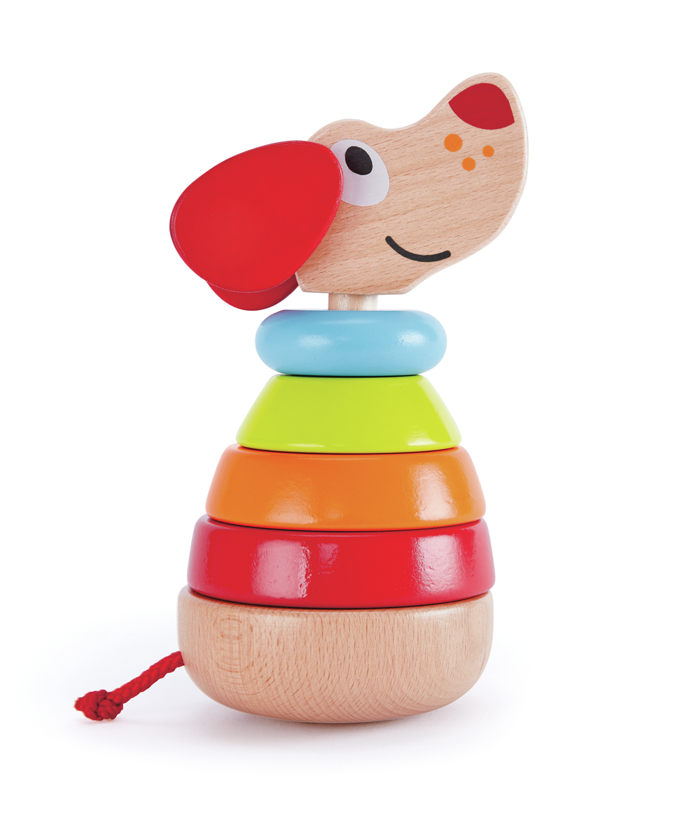 Colorful wooden toy with a dog-like face on a white background