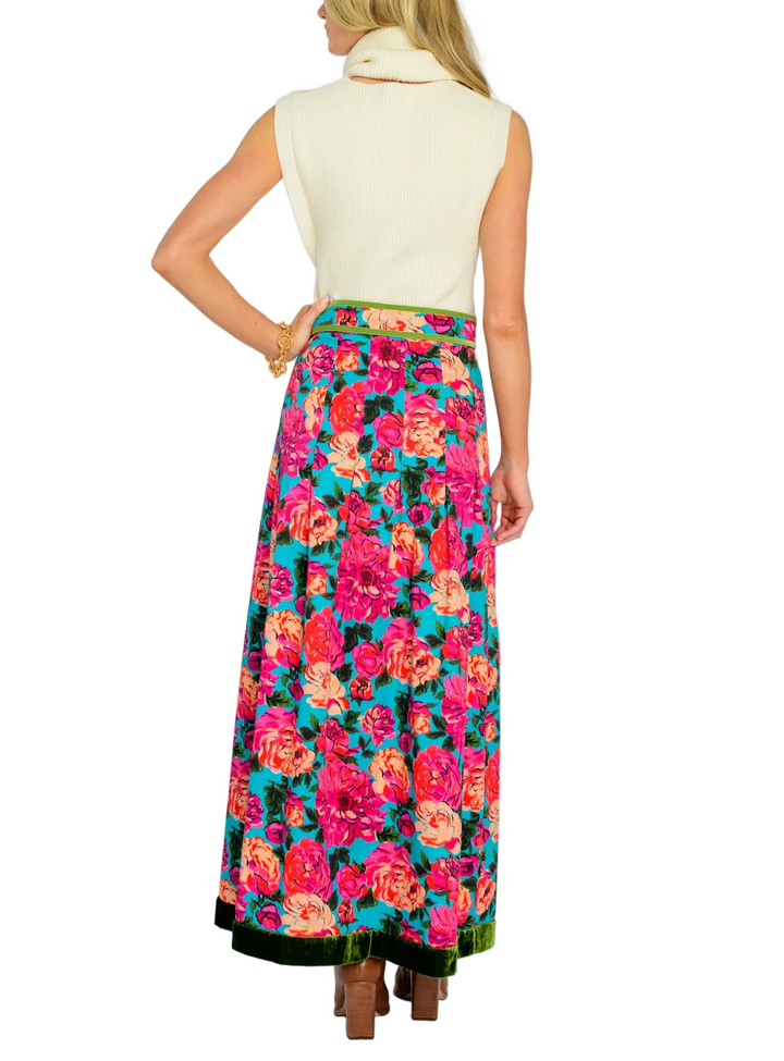 Tailored and classy, Peyton is our newest skirt silhouette. Her stitched down pleats create a slightly flared body, tied together with a pretty matching belt buckle and green velvet trim.

 