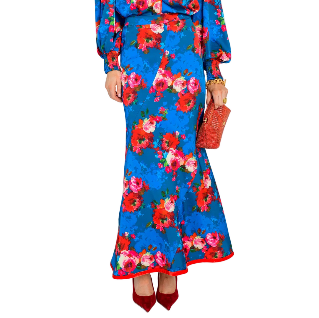 Our Serena Skirt is a showstopper this season in a silky satin fabric, featuring a chic fitted silhouette and flared hem. Perfect to style with a solid top, we especially love her paired with suede boots or heels.