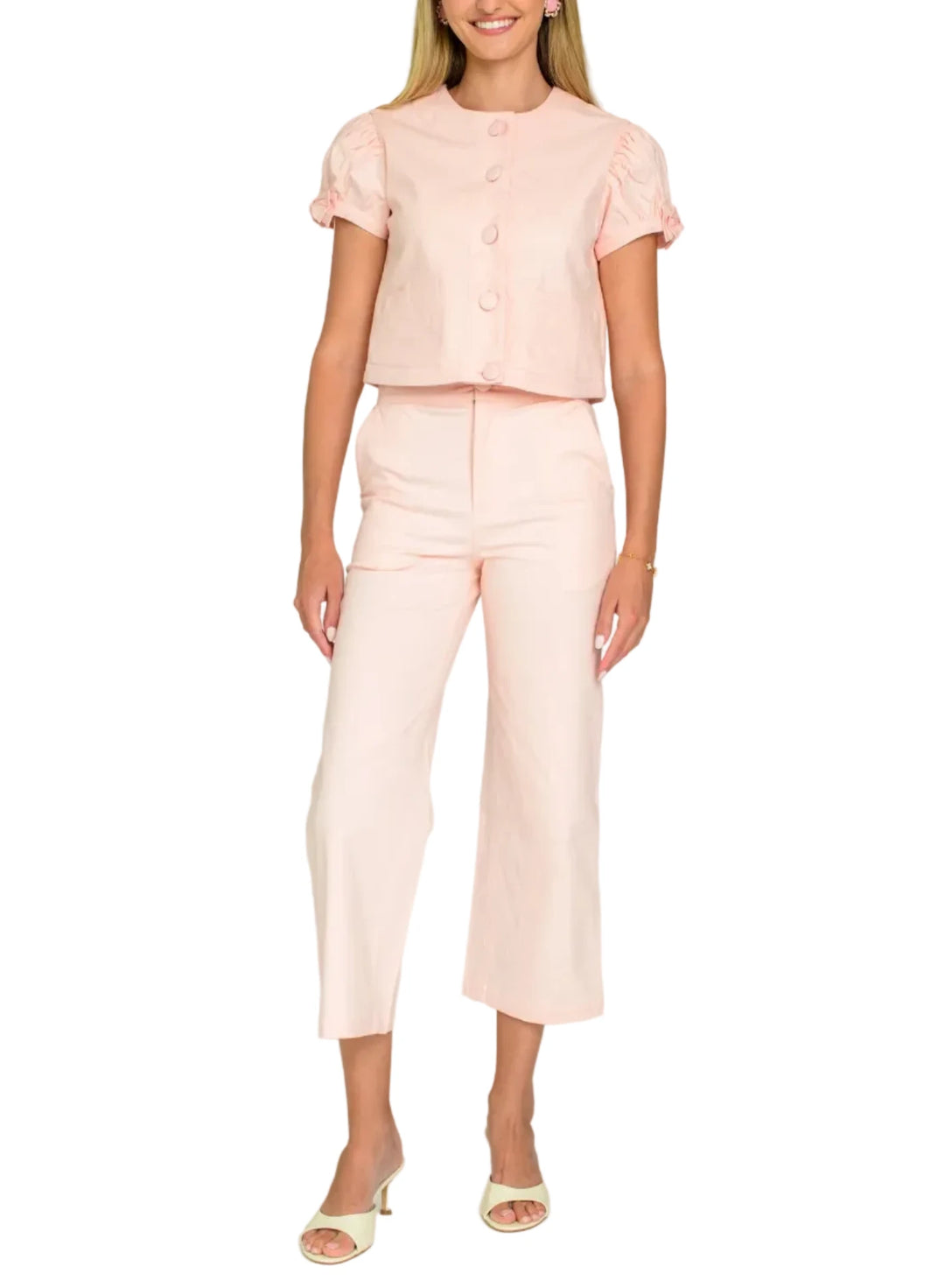 Our button front Coco Top is a darling silhouette that can also be worn as a jacket. With puffed sleeves, oversized fabric buttons, and bow details, she is the sweetest wardrobe addition for the Spring season.

Cut from a fabulous stretch twill, our Tilda pants combine tailored sophistication with a comfortable, easy fit. Adorned with a classic pant fly and decorative pockets, Tilda is an easy style to pair back to solids or wear as a matching set.