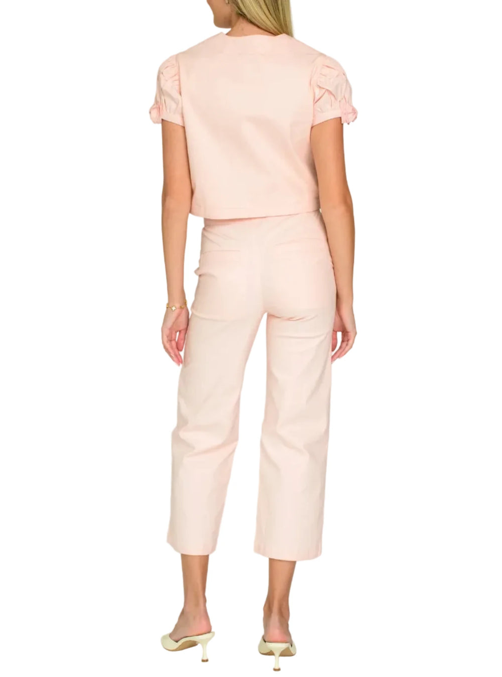 Our button front Coco Top is a darling silhouette that can also be worn as a jacket. With puffed sleeves, oversized fabric buttons, and bow details, she is the sweetest wardrobe addition for the Spring season.

Cut from a fabulous stretch twill, our Tilda pants combine tailored sophistication with a comfortable, easy fit. Adorned with a classic pant fly and decorative pockets, Tilda is an easy style to pair back to solids or wear as a matching set.