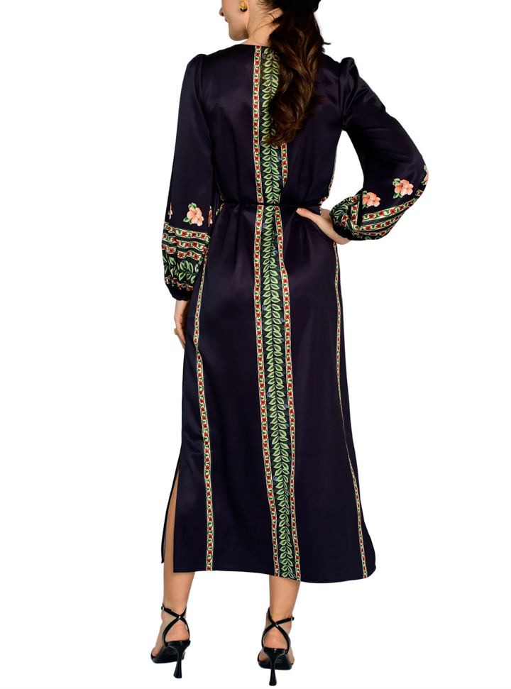 Dawn is a relaxed maxi dress, elevated with a stunning Holiday print, balloon sleeves, and an optional cord belt. She is one of our favorite picks for this time of year, perfect for staying stylish and comfortable throughout the Holiday season.