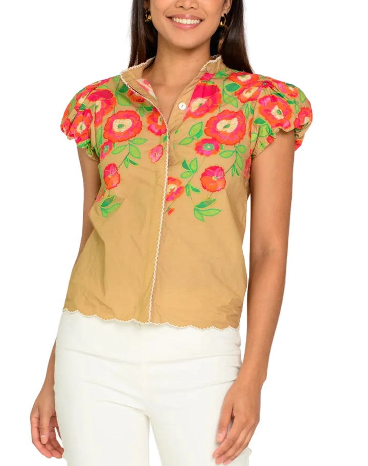 Our fan favorite Emily Top is ready for the Spring season with this short puff sleeve modification, perfect for the warm weather ahead. She features a mandarin collar and a covered front placket, both adorned with white embroidery trim accents.

 

Shown in Poppy Patch Iced Coffee

Complete the set! Pair with our matching Jojo Shorts or Anita Skirt

 

Product Details

Cotton poplin
Mandarin collar
Button front
Covered placket
Puffed short sleeves with elastic cuffs