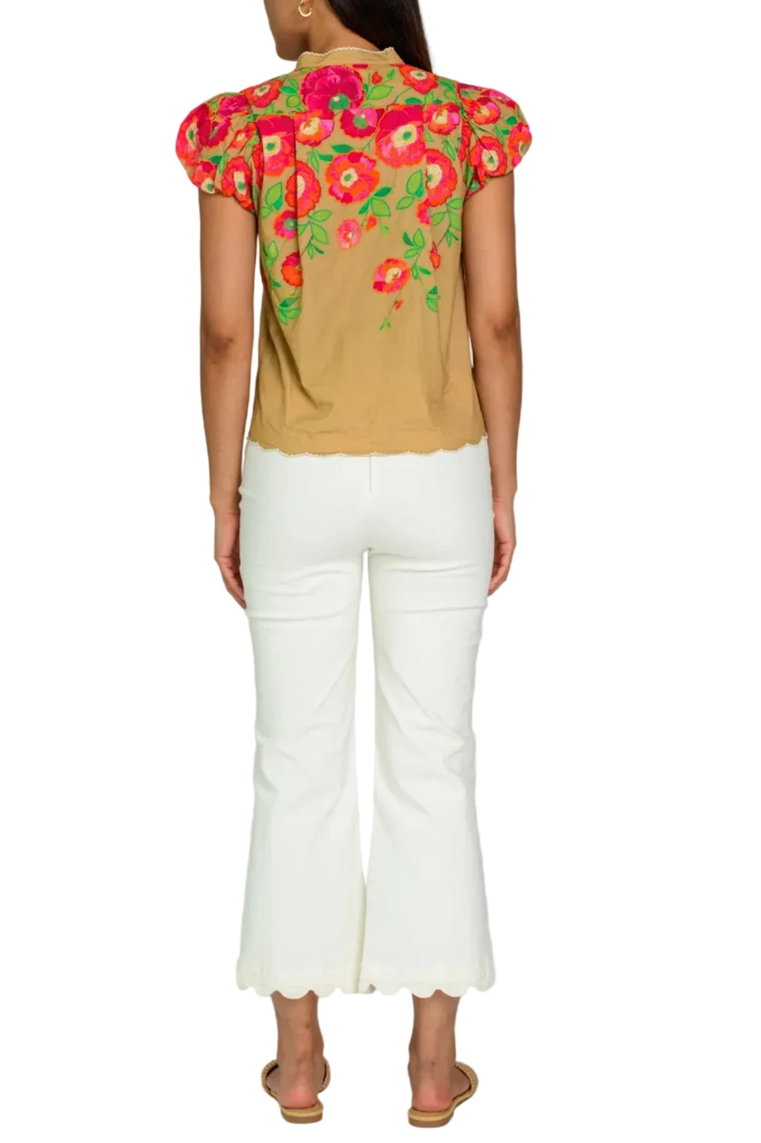 Our fan favorite Emily Top is ready for the Spring season with this short puff sleeve modification, perfect for the warm weather ahead. She features a mandarin collar and a covered front placket, both adorned with white embroidery trim accents.

 

Shown in Poppy Patch Iced Coffee

Complete the set! Pair with our matching Jojo Shorts or Anita Skirt

 

Product Details

Cotton poplin
Mandarin collar
Button front
Covered placket
Puffed short sleeves with elastic cuffs