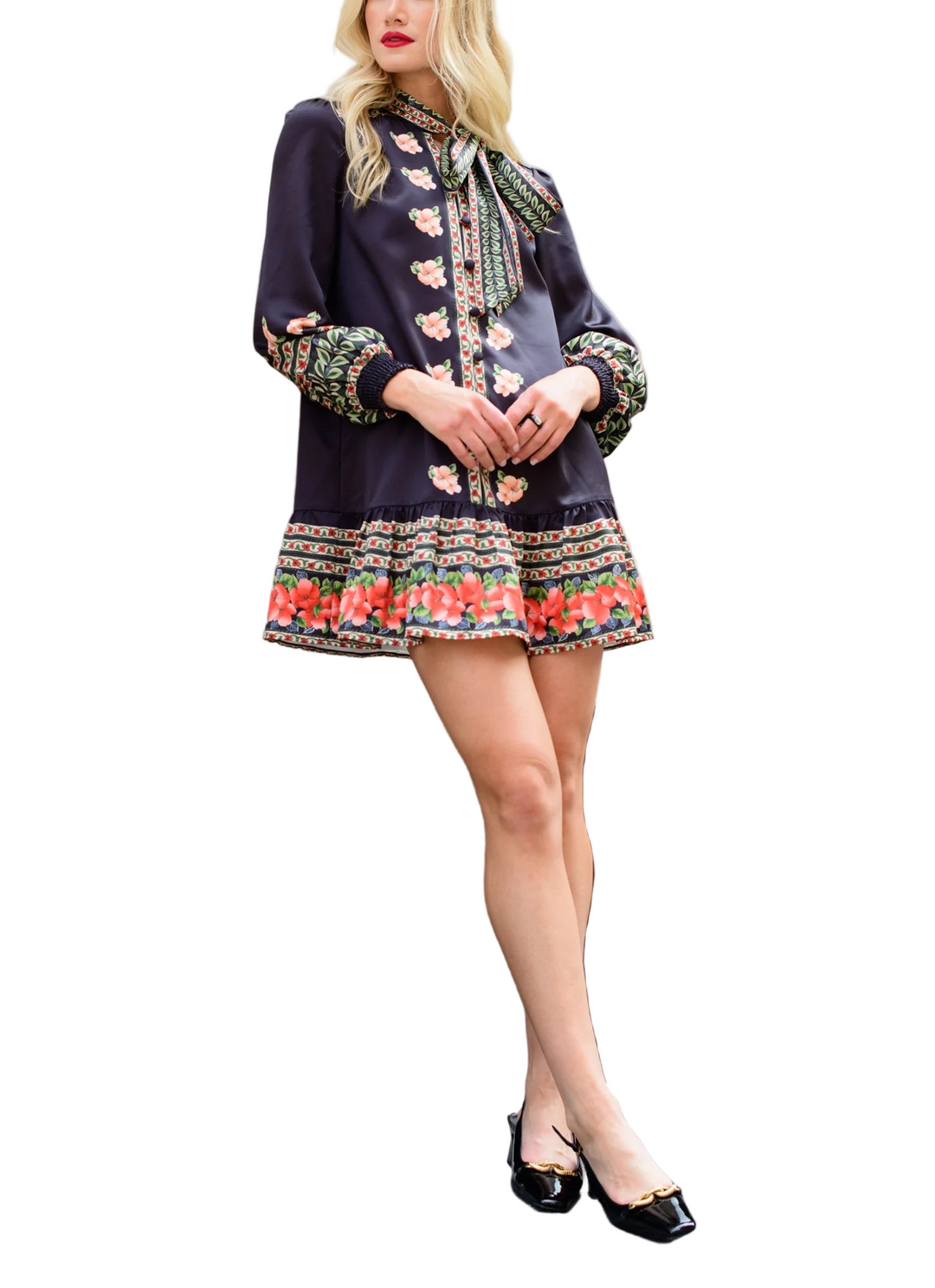 Our darling, feminine Brit Bow blouse just got even better! We added a ruffle hem skirt, turning this vintage 80's inspired silhouette into the cutest Holiday mini dress. Pair with some black tights and heels for an easy, chic look.