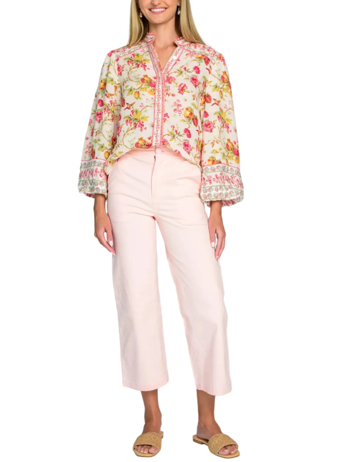Cut from a light linen blend fabric, the Emily top in English Gardens is the perfect button front blouse to dress up or down this season. She features a mandarin collar, covered placket, and bubble hem sleeves, all adorned with decorative trim.