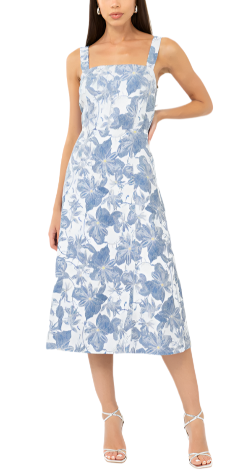 This strappy midi is imagined in a floral jacquard. The dress is installed with a square neckline and back zipper.