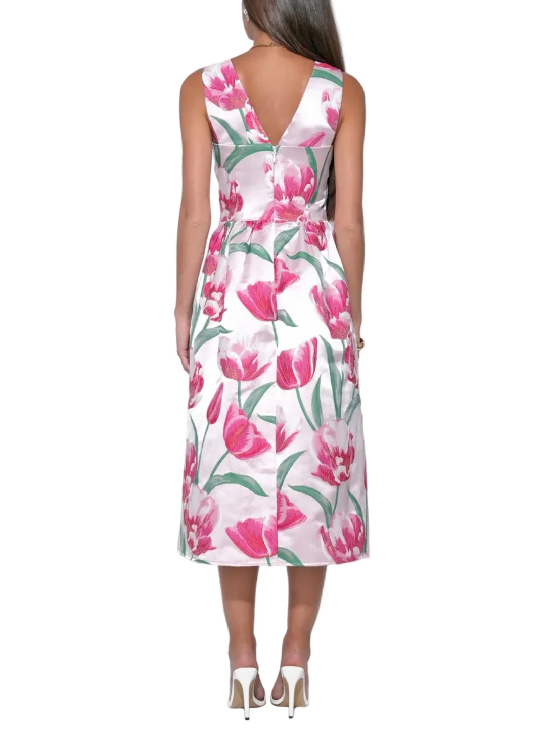 The jacquard weave creates a raised, dimensional floral pattern that catches the light with every movement, giving the dress a sophisticated, high-end weight. The sweetheart neckline offers a romantic, contoured frame for the décolletage, while the midi-length skirt provides a graceful, tea-length sweep that is both modest and chic.
